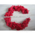 party backdrop decoration of red feather boa